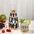 colorful paper rattan wrapped glass drinking glass